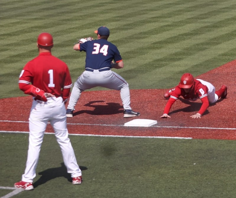 Collegiate baseball pickoff play captured by Ethan Paskal