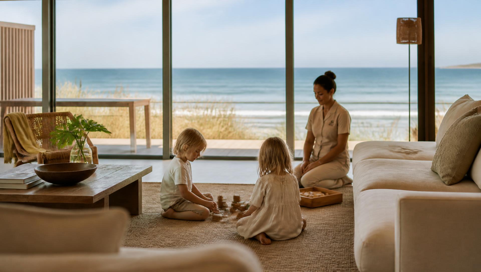 A nanny watches two children play in a luxury beachfront residence in Uruguay.