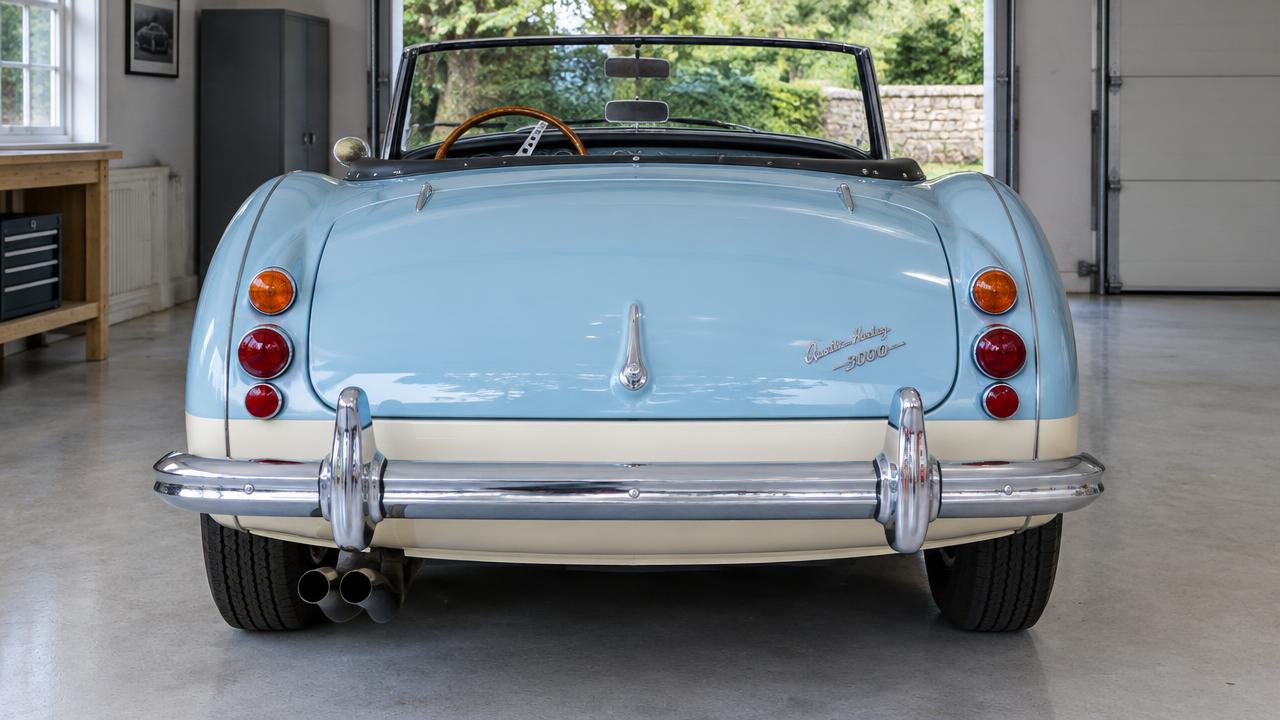Vehicle 2 — 1963 Austin-Healey 3000 MkIII (Healey blue over ivory, bay 2) — Rear — photo 3